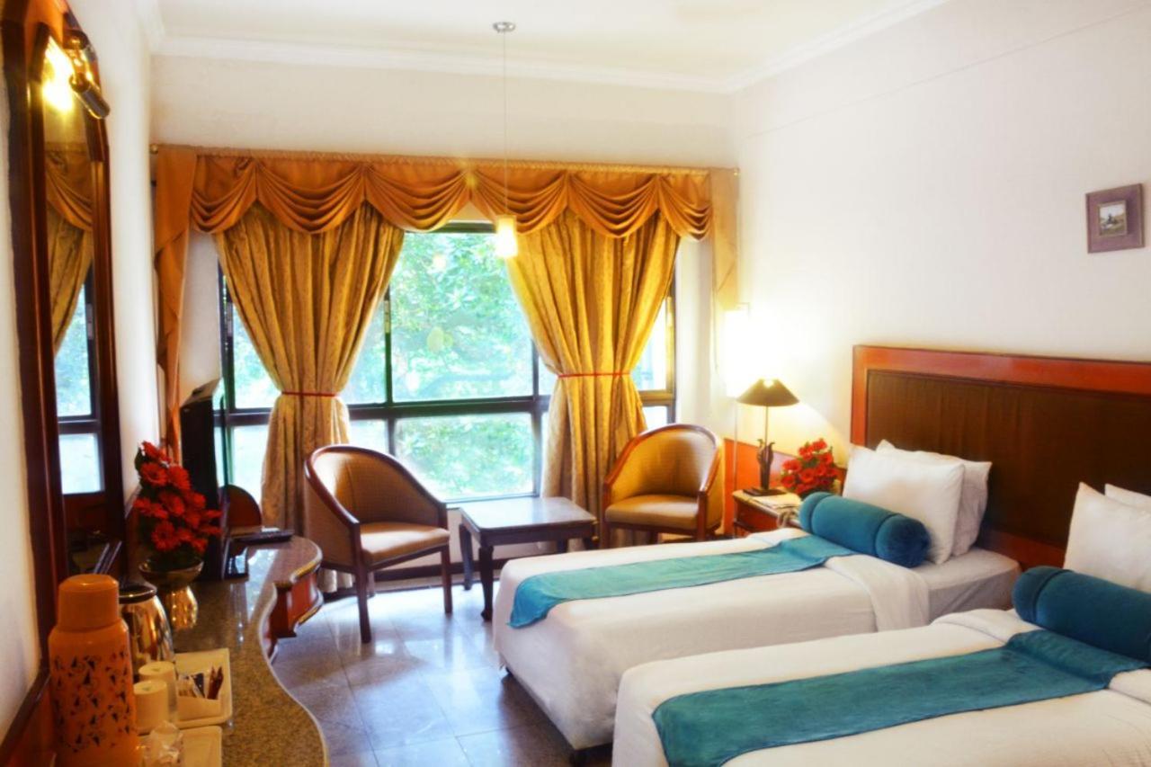 होटल Ashraya International Bangalore